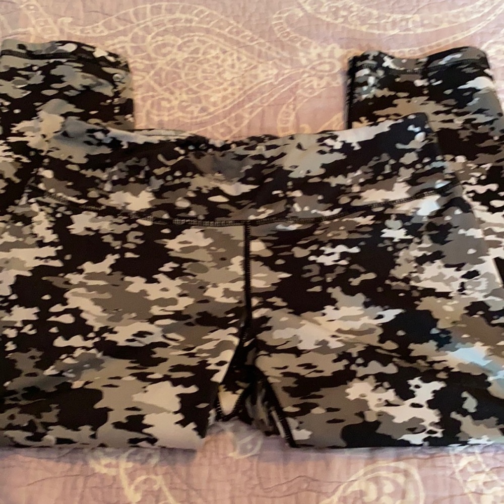 2 pair of crop leggings. 1 is Reebok 1 is RBX.